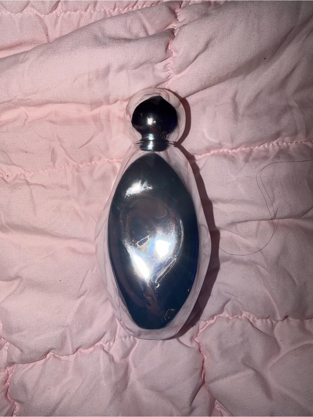 Kylie Cosmetics Silver Metallic Bottle Accent with Pink Backdrop